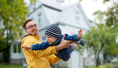 Image showing father with son playing and having fun outdoors