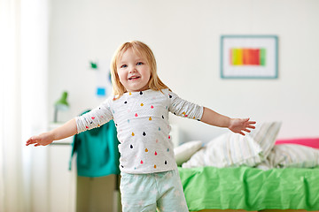 Image showing happy little girl having fun at home