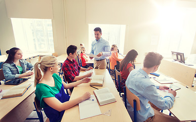 Image showing group of students and teacher with test results