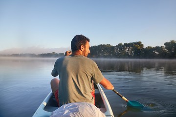 Image showing Canoe tour on a river