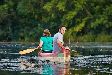 Image showing Canoe tour on a river