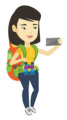 Image showing Woman with backpack making selfie.