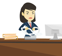 Image showing Angry business woman tearing bills or invoices.