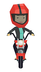 Image showing Woman riding motorcycle at night.