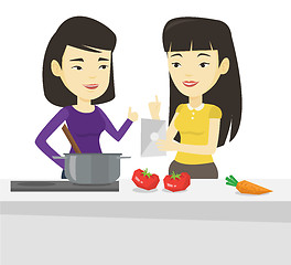 Image showing Women cooking healthy vegetable meal.