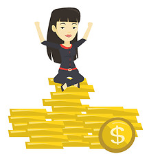 Image showing Happy business woman sitting on golden coins.