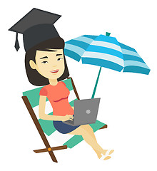 Image showing Graduate lying in chaise lounge with laptop.