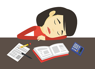 Image showing Student sleeping at the desk with book.