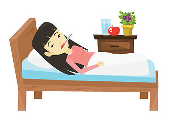 Image showing Sick woman with thermometer laying in bed.