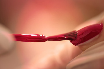 Image showing Woman hands receiving a manicure