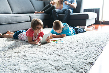 Image showing young couple spending time with kids