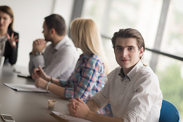 Image showing Group of young people meeting in startup office