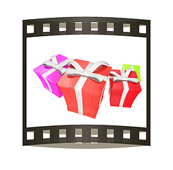 Image showing Gift boxes. 3d illustration. The film strip.