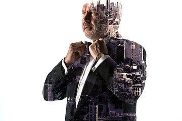 Image showing Portrait of bearded businessman. Double exposure city on the background.