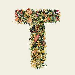 Image showing Tea leaf with flowers and fruits, letter T on white background, top view