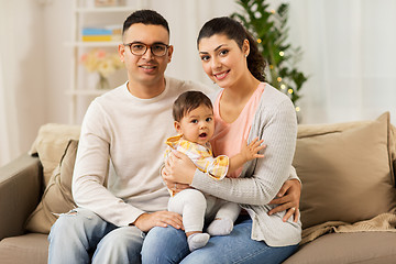 Image showing happy family with baby daughter at home