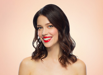 Image showing beautiful smiling young woman with red lipstick