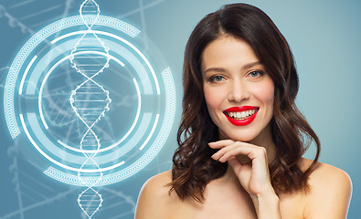 Image showing woman with red lipstick over dna molecule