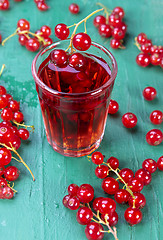 Image showing Redcurrant and glass with fruits and drink juice
