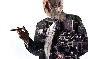 Image showing Portrait of bearded businessman. Double exposure city on the background.