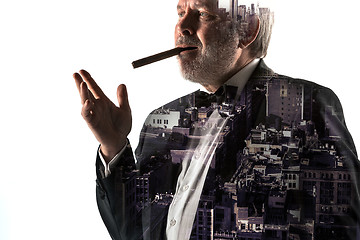 Image showing Portrait of bearded businessman. Double exposure city on the background.