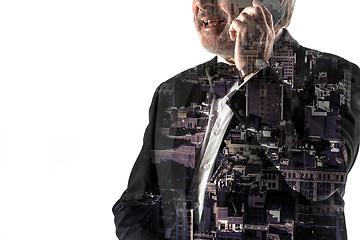 Image showing Portrait of bearded businessman smiling. Double exposure city on the background.