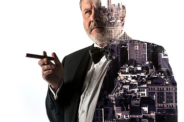 Image showing Portrait of bearded businessman. Double exposure city on the background.