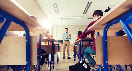 Image showing students and teacher with tablet pc at school