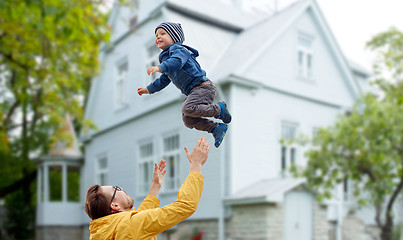 Image showing father with son playing and having fun outdoors