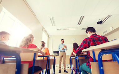 Image showing students and teacher with tablet pc at school