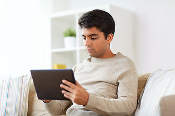 Image showing man with tablet pc at home