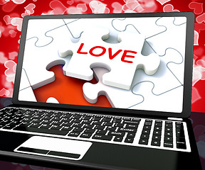 Image showing Love Puzzle On Laptop Shows Internet Dating