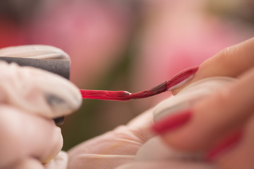 Image showing Woman hands receiving a manicure