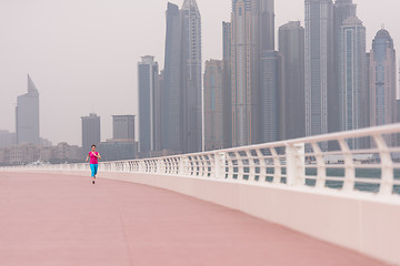 Image showing woman running on the promenade