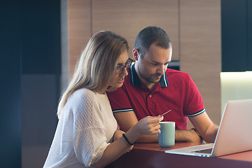 Image showing happy young couple buying online