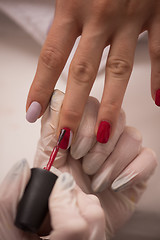 Image showing Woman hands receiving a manicure