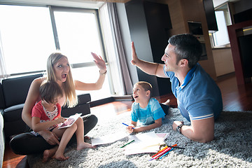 Image showing young couple spending time with kids