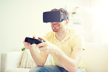 Image showing man in virtual reality headset with controller