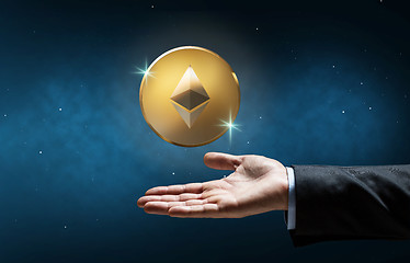 Image showing businessman hand with etherum over space