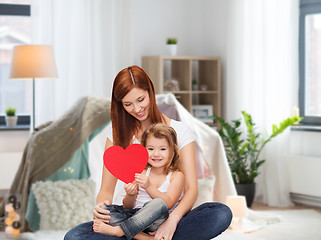 Image showing happy mother with adorable little girl and heart