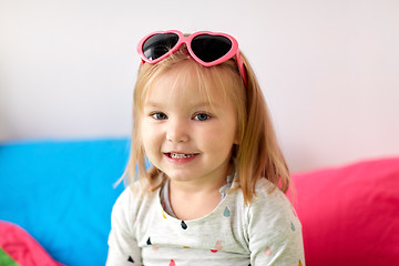 Image showing portrait of smiling little girl with sunglasses