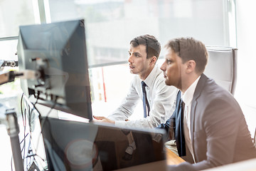 Image showing Business team analyzing data at business meeting.