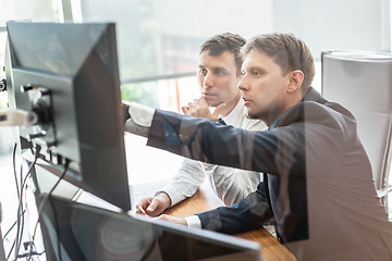 Image showing Business team analyzing data at business meeting.