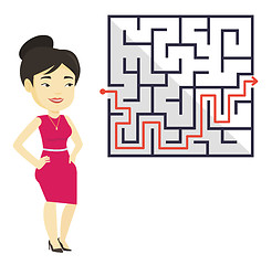 Image showing Business woman looking at labyrinth with solution.