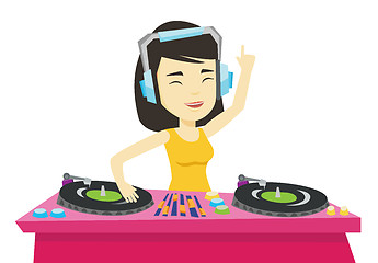 Image showing DJ mixing music on turntables vector illustration.