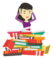 Image showing Student sitting in huge pile of books.