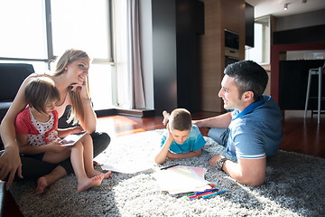 Image showing young couple spending time with kids