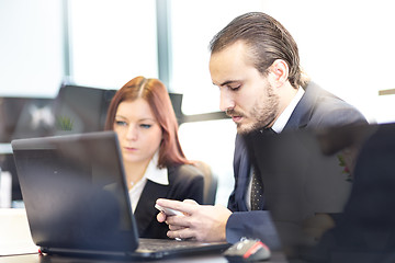 Image showing Business people in modern office.