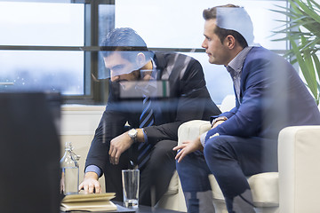 Image showing Business team analyzing data at business meeting.