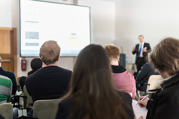 Image showing Business speaker giving a talk at business conference event.